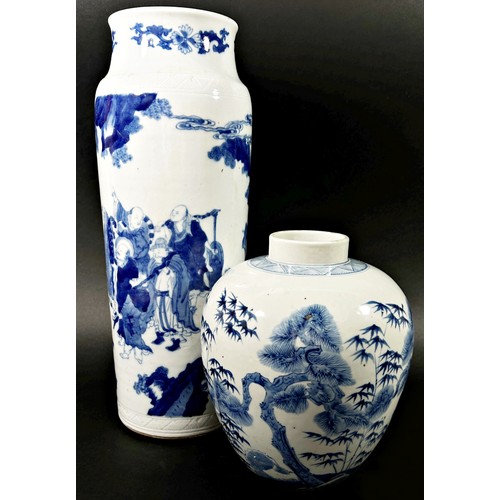 38 - A 19th century Chinese blue and white porcelain cylinder vase with drawn neck and incised borders be... 