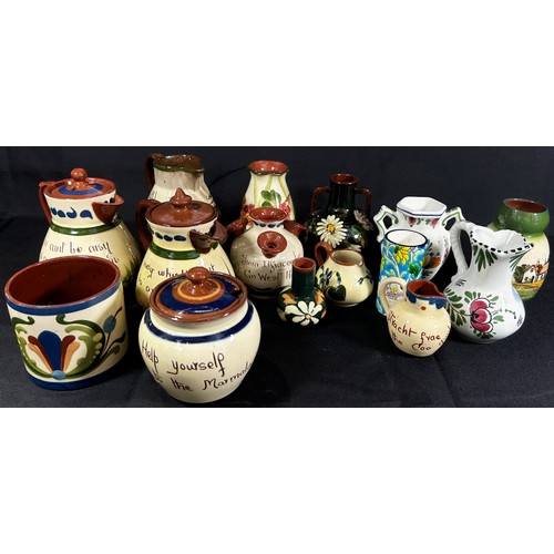 97 - A collection of Torquay Motto ware to include jugs, vases, etc, also together with two Royal Doulton... 