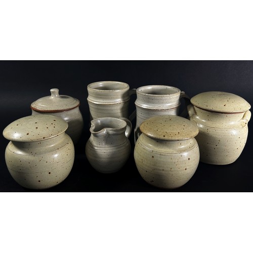 98 - Seven pieces of Winchcombe pottery by Ray Winch including storage jars and covers, two tankards and ... 