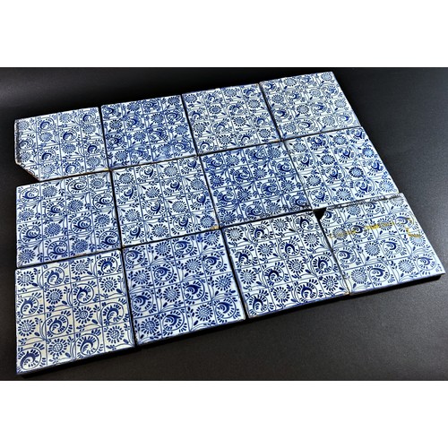 90 - A collection of 18th century and later blue and white Delft tiles, various designs, 35 in total appr... 