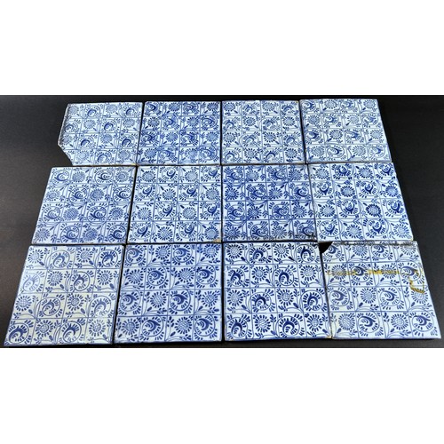 90 - A collection of 18th century and later blue and white Delft tiles, various designs, 35 in total appr... 