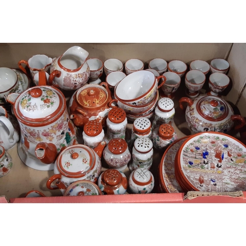 116 - An extensive collection of late 19th century/ early 20th century Japanese porcelain tea wares, teapo... 