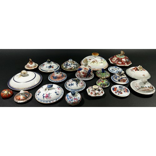 41 - A large and interesting selection of 18th century and later pot and jar covers, principally Chinese ... 