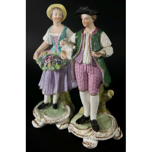 74 - A pair of 19th century Derby porcelain figures, young shepherd and maiden, marks to underside, each ... 