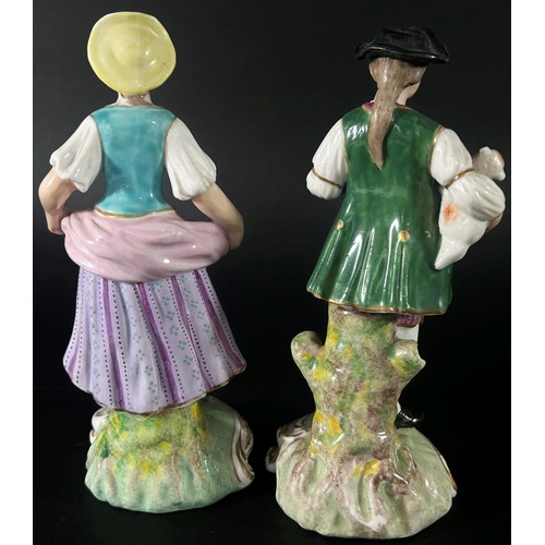 74 - A pair of 19th century Derby porcelain figures, young shepherd and maiden, marks to underside, each ... 