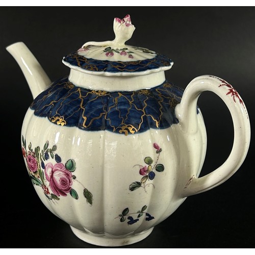 76 - An 18th century Liverpool porcelain teapot of pumpkin/gourd  form with floral sprig painted motifs a... 