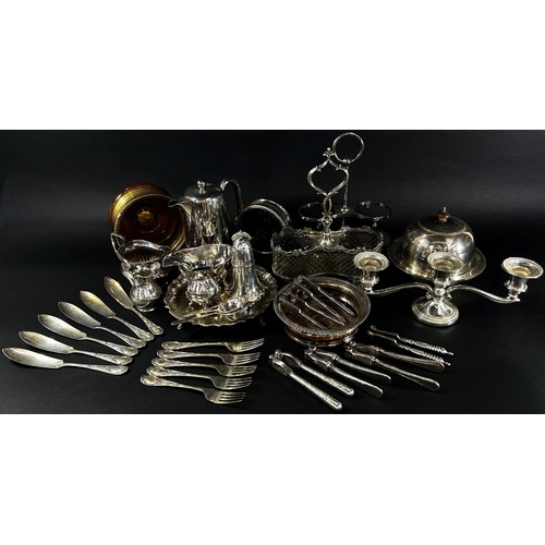 172 - A quantity of silver plated table ware, including two bottle stands, a muffin dish, sauce boat, suga... 