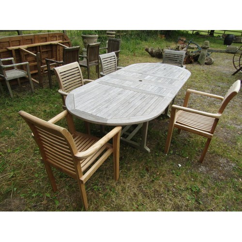 1158 - A Cotswold collection weathered contemporary teak D end extending garden table, the slatted panelled... 