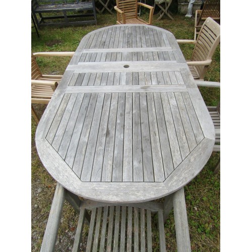 1158 - A Cotswold collection weathered contemporary teak D end extending garden table, the slatted panelled... 