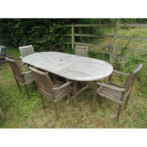 1163 - A Cotswold Collection contemporary weathered teak D end extending garden table, the slatted panelled... 