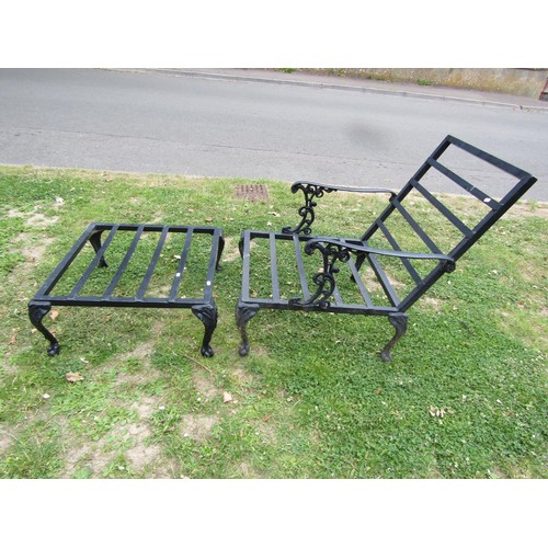 1181 - A painted cast light metal garden chair frame with open scrolled arms raised on claw and ball suppor... 