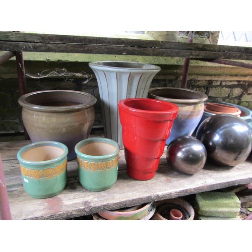 1185 - A collection of good quality contemporary glazed planters of varying size, design and colourway, two... 