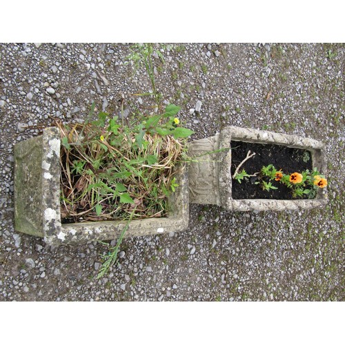 1156 - Two weathered cast composition stone rectangular flower troughs of varying design with relief detail... 