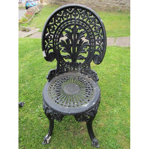 1192 - A painted and weathered cast alloy garden terrace table or circular form with decorative pierced top... 