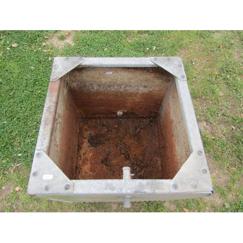 1193 - A vintage heavy gauge galvanised steel water tank of square cut form with pop riveted seams, 50 cm s... 