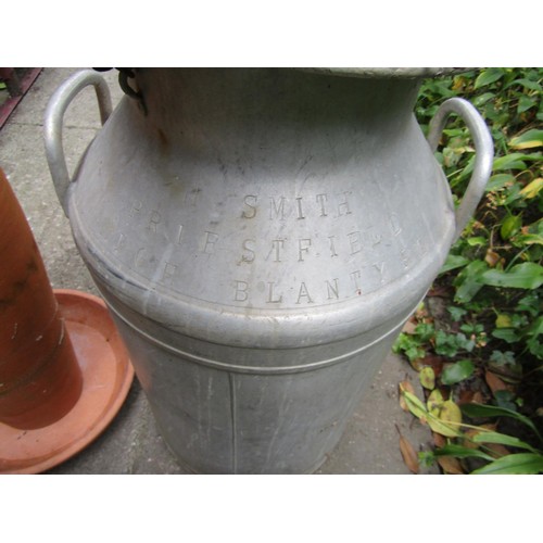 1195 - An aluminium milk churn and cap stamped H Smith Priestfield High Blanty RE, together with a pair of ... 