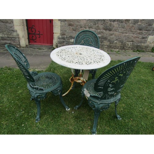 1197 - A painted and weathered cast iron and alloy garden terrace table with decorative pierced circular to... 