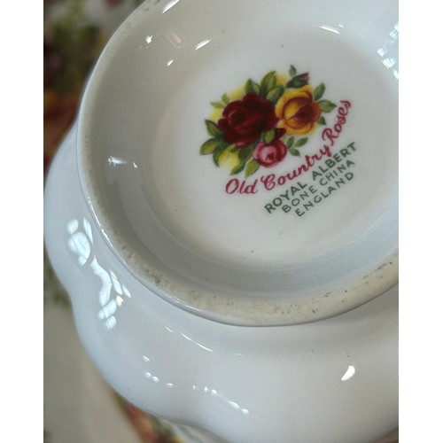 5 - A quantity of Royal Albert Old Country Roses comprising six tea cups, saucers and side plates, cake ... 