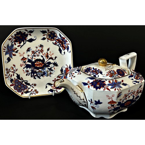 129 - An early 19th century Spode porcelain teapot and stand in the Imari palette, each marked and numbere... 