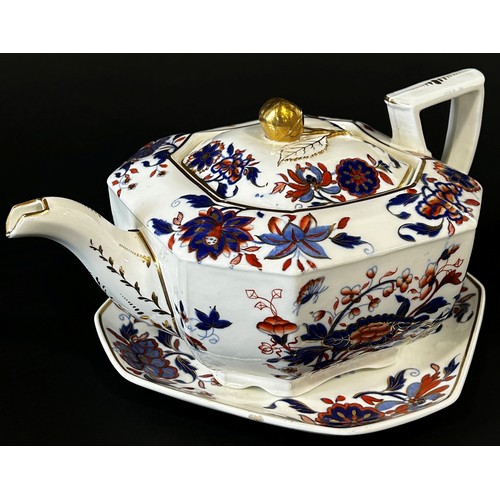 129 - An early 19th century Spode porcelain teapot and stand in the Imari palette, each marked and numbere... 