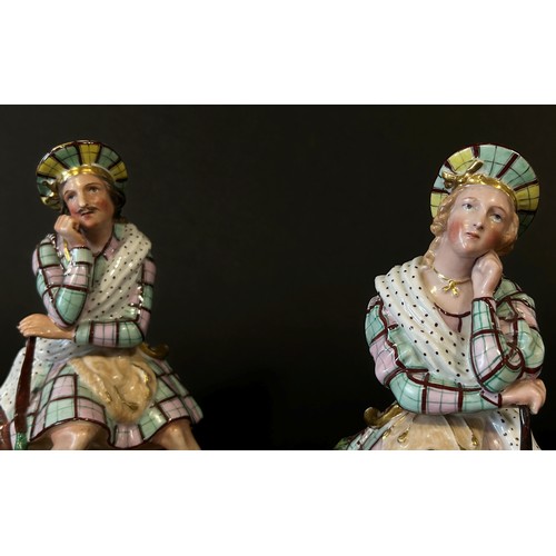 127 - A pair of 19th century French Paris porcelain Scottish Highlander figural flasks, in the form of sea... 