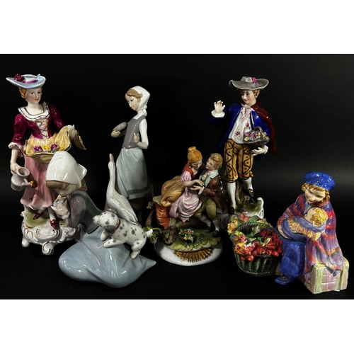 121 - A mixed collection of decorative porcelain figures to include Lladro examples, a Royal Doulton 