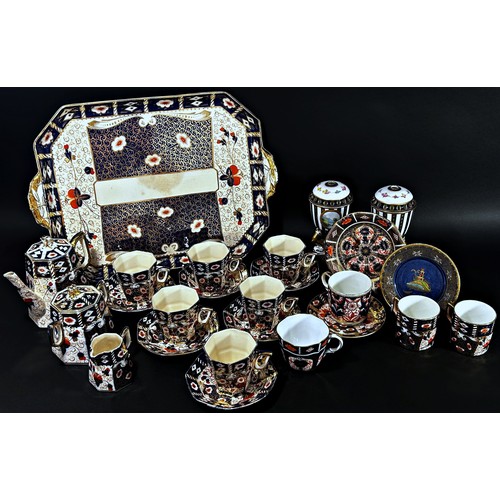 120 - A quantity of Royal Crown Derby Imari pattern coffeewares to include six octagonal coffee cans, four... 