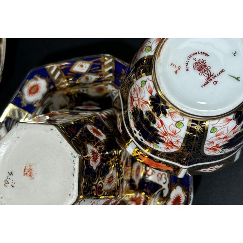 120 - A quantity of Royal Crown Derby Imari pattern coffeewares to include six octagonal coffee cans, four... 