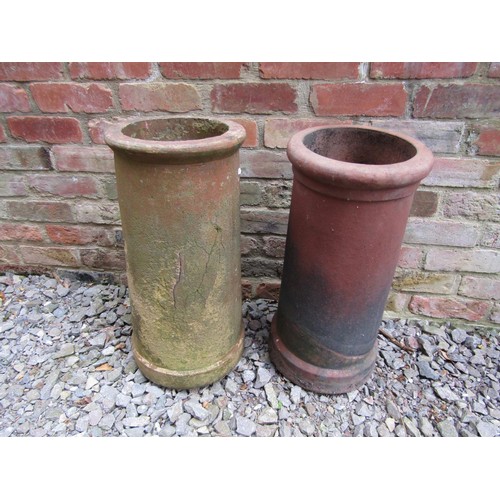 1207 - Two similar weathered chimney pots of cylindrical tapered form (af) 60 cm high