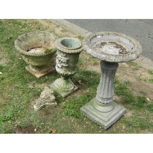 1208 - A weathered cast composition stone two sectional bird bath with fluted pedestal together with two ca... 