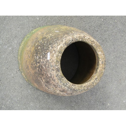 1209 - A weathered buff coloured cylindrical crown top chimney pot 74 cm high together with a weathered ter... 