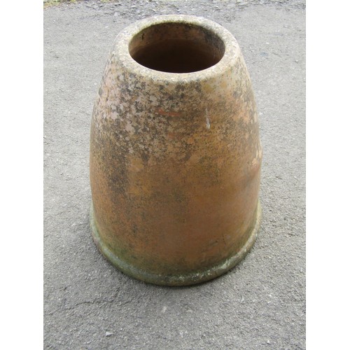 1209 - A weathered buff coloured cylindrical crown top chimney pot 74 cm high together with a weathered ter... 