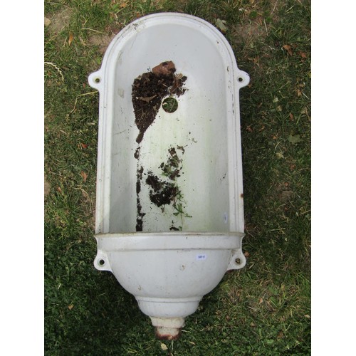 1217 - A cast iron and enamel niche font of arched form with bow fronted reservoir approx 70 cm high x 38 c... 