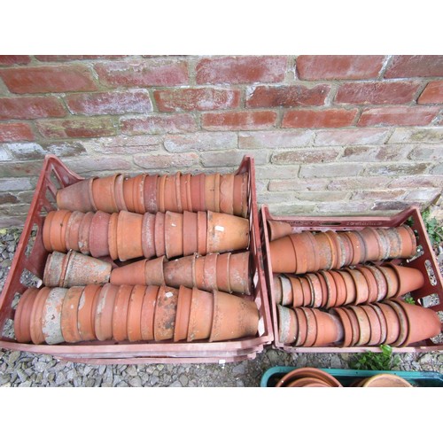 1223 - Approx 200 weathered terracotta flower pots of varying size, an average example 13 cm high x 14 cm d... 