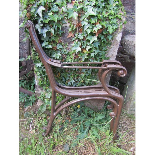 1240 - A pair of painted cast iron bench ends with scroll detail