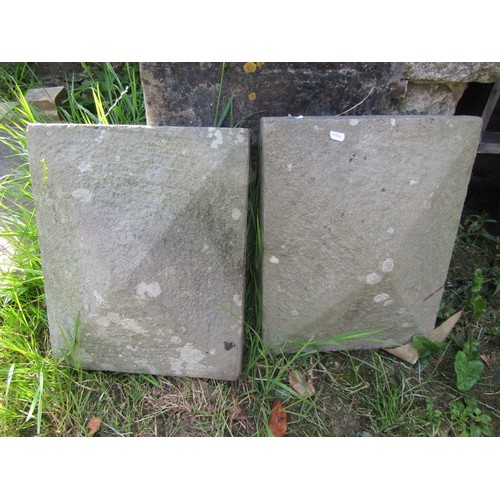 1244 - A pair of carved natural stone rectangular pyramid shaped pier caps 45 cm x 36 cm