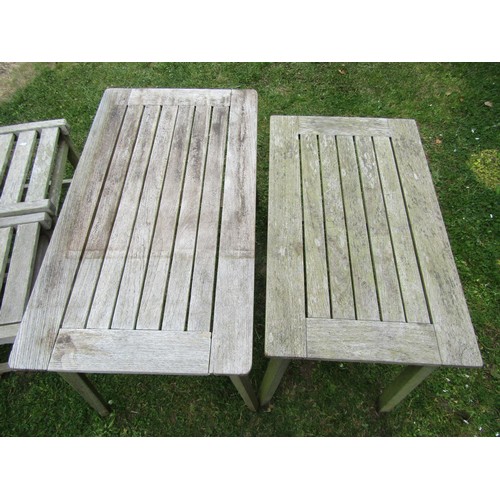 1245 - A vintage weathered teak two seat garden bench with slatted seat and back (probably a Lister example... 