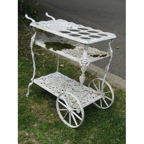 1246 - A decorative painted cast alloy, three tier, two wheeled drinks trolley/cart with decorative pierced... 