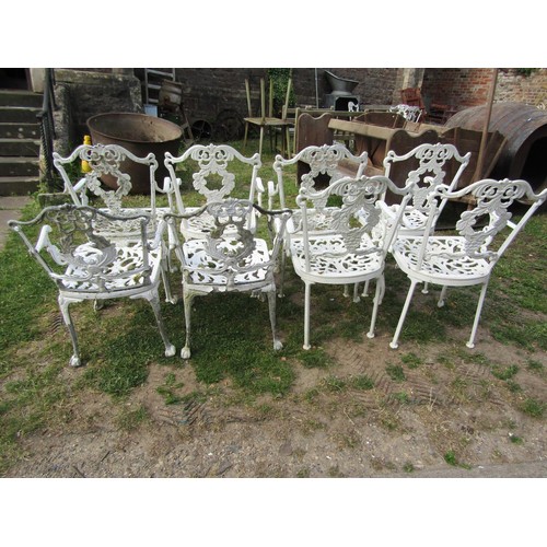 1253 - 8 similar weathered cream painted cast aluminium garden terrace chairs with open arms and decorative... 