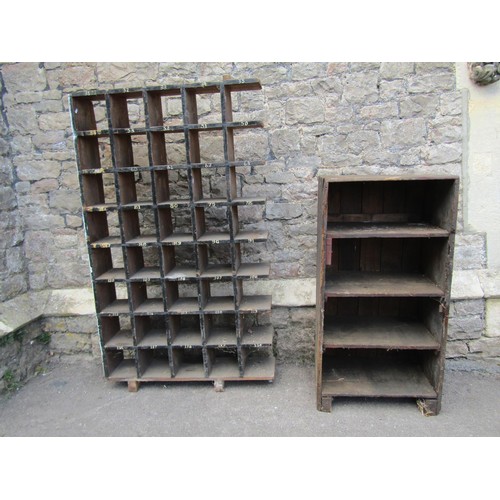 1270 - A rustic stained pine segmented pigeon  hole shelving unit, 145 cm high x 86 cm wide x 23 cm deep, t... 