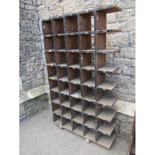 1270 - A rustic stained pine segmented pigeon  hole shelving unit, 145 cm high x 86 cm wide x 23 cm deep, t... 