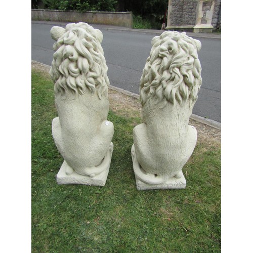 1291 - A pair of good quality contemporary cast composition stone garden terrace/pier ornaments in the form... 