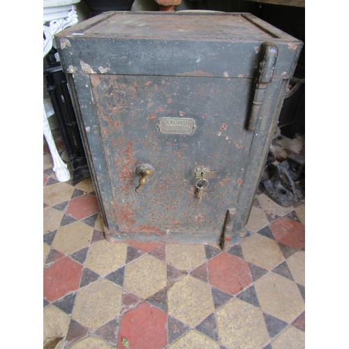 1288 - C H Wilson & Co of Birmingham metal safe with key, 72cm high x 55cm deep x 55cm wide