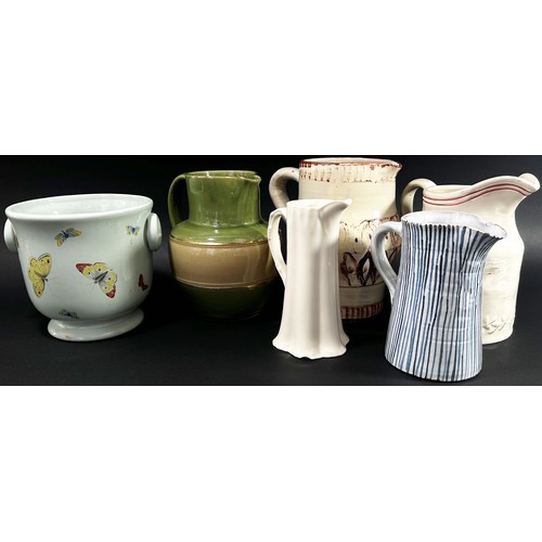 119 - Mixed Studio ware and other jugs, a pair of porcelain baluster desk lamps, a silver plated cloche, t... 