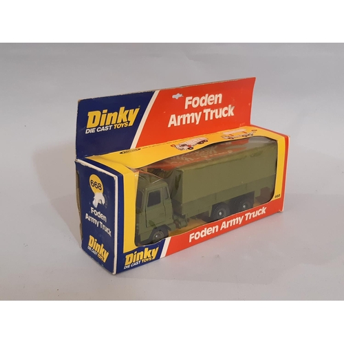 887 - A collection of Dinky military vehicles including boxed Foden Army Truck 668, unboxed Tank Transport... 