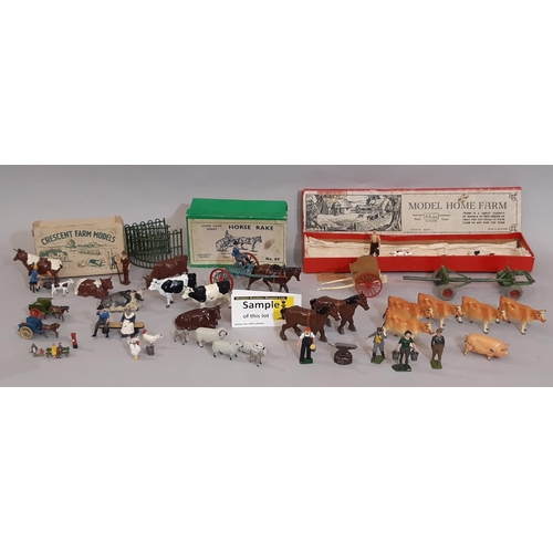 889 - A collection of Model Home Farm toys including boxed Horse Rake 8F, various unboxed animals, impleme... 