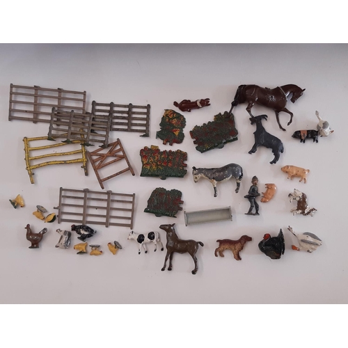 889 - A collection of Model Home Farm toys including boxed Horse Rake 8F, various unboxed animals, impleme... 