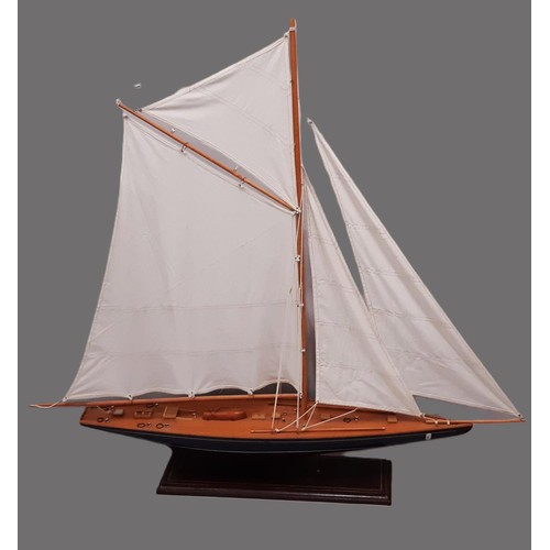 892 - A large hand built model of a gaff rigged cutter/ sailing boat built in timber and well finished, wi... 