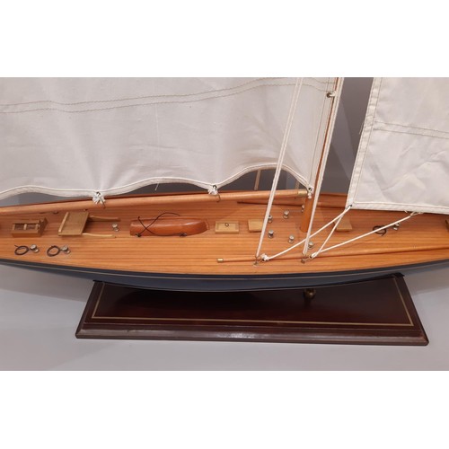 892 - A large hand built model of a gaff rigged cutter/ sailing boat built in timber and well finished, wi... 