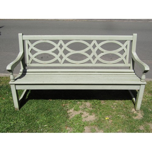 1257 - A good quality heavy gauge light green painted teak three seat garden bench with curved slatted seat... 